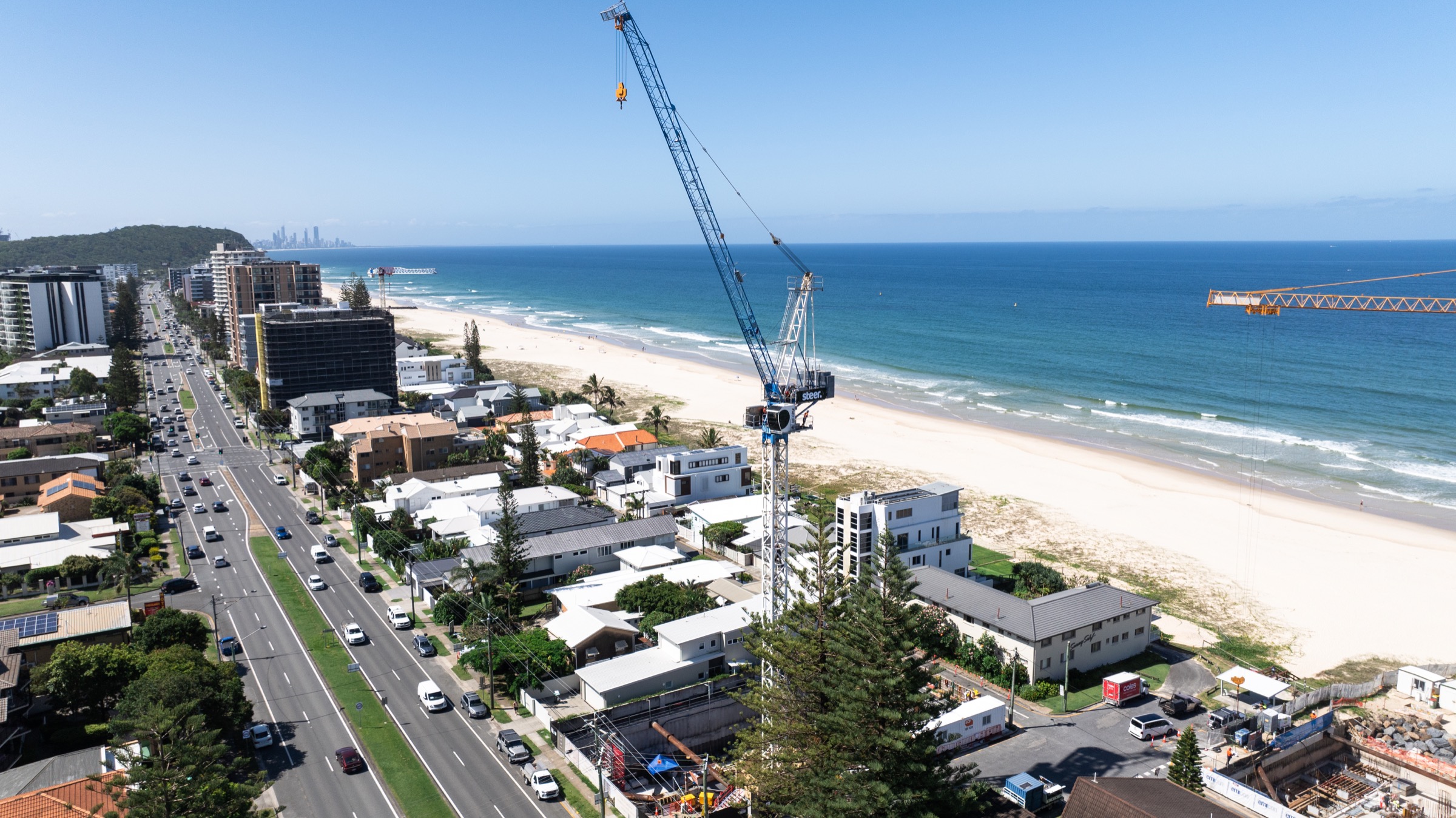 Created branded crane working over the coastline
