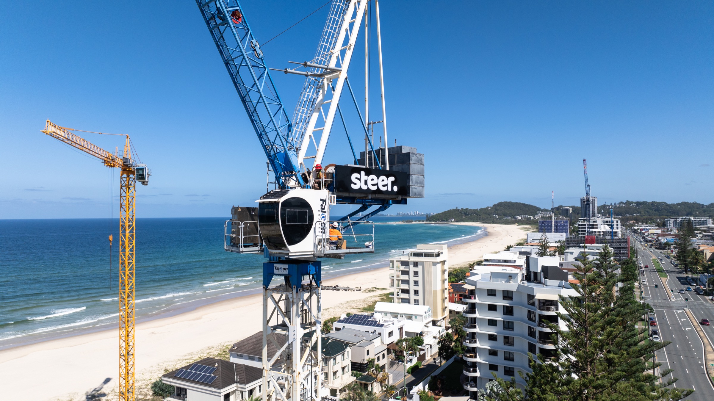 Created crane over a coastal construction site